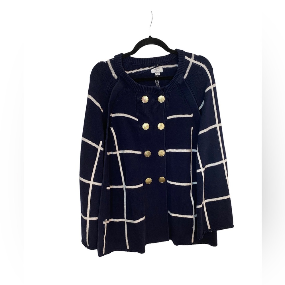 Navy Blue and White Poncho. One Size fits all. New condition, Never Worn.